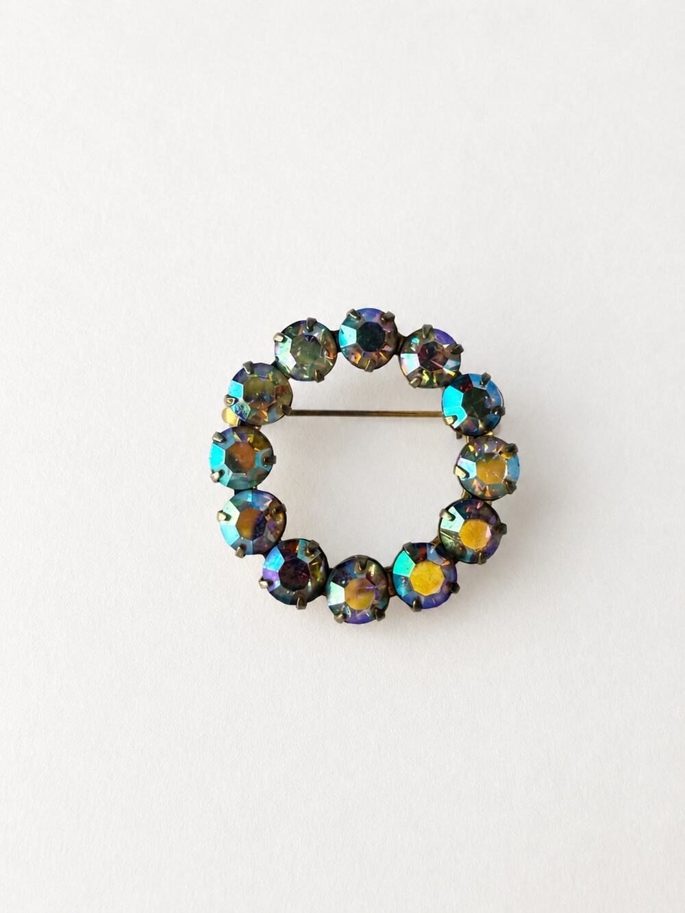 Vintage Aurora Borealis Rhinestone Circle Wreath Brooch Gold Tone Pin 1.25 Inch